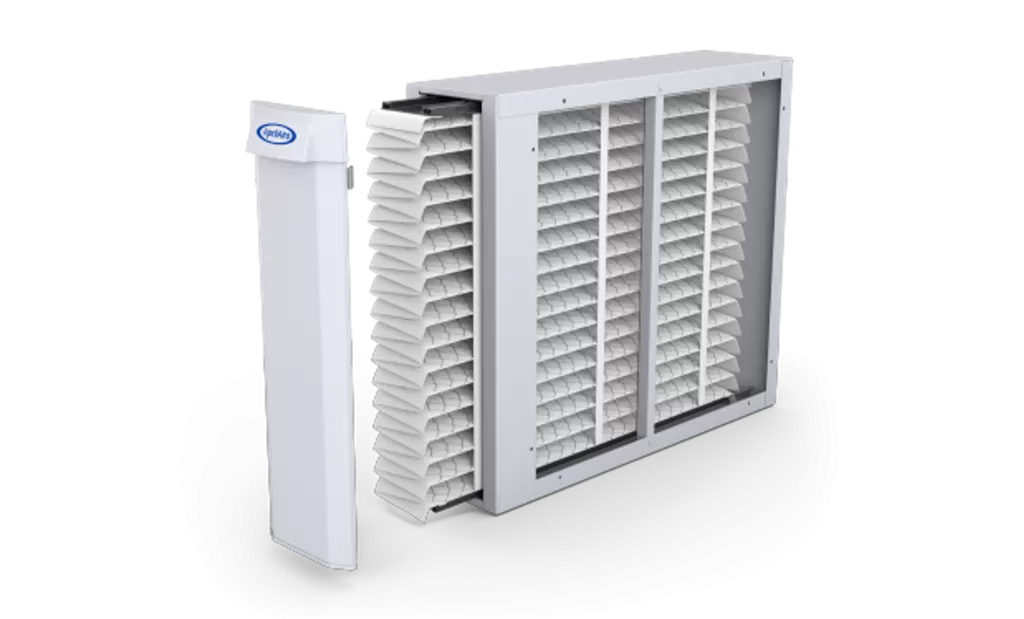 AprilAire whole-home air purifier cabinet with its replaceable media filter pulled partway out